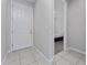 Clean entryway with tile flooring and access to bedroom at 3573 Bristol Cove Ln, St Cloud, FL 34772