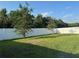 Private, fenced backyard with well-maintained lawn, offering a peaceful outdoor space at 3573 Bristol Cove Ln, St Cloud, FL 34772
