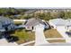 Inviting single-story home featuring a well-manicured lawn, two-car garage, and white picket fence at 3573 Bristol Cove Ln, St Cloud, FL 34772