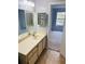 Clean bathroom with single sink vanity and shower/tub combo at 3854 Southpointe Dr # 1, Orlando, FL 32822