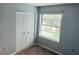 Bright bedroom with double door closet and carpeted floor at 3854 Southpointe Dr # 1, Orlando, FL 32822