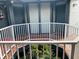 Shared hallway with two private entrances and a view of courtyard at 3854 Southpointe Dr # 1, Orlando, FL 32822
