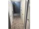 Light-filled hallway with neutral carpeting and built-in closets at 3854 Southpointe Dr # 1, Orlando, FL 32822