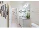 Modern bathroom with granite countertop, double vanity, and stylish decor at 4154 Lana Ave, Davenport, FL 33897