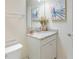 Small bathroom with a vanity and granite countertop at 4154 Lana Ave, Davenport, FL 33897