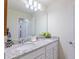 Double vanity bathroom with granite countertop at 4154 Lana Ave, Davenport, FL 33897