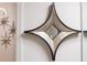 Decorative starburst mirror on the wall at 4154 Lana Ave, Davenport, FL 33897