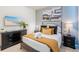 Guest bedroom with a dresser, TV and comfortable bed at 4154 Lana Ave, Davenport, FL 33897