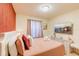 Bright bedroom with a comfortable bed and stylish decor at 4154 Lana Ave, Davenport, FL 33897