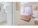 Cozy bedroom featuring a comfortable bed and tasteful decor at 4154 Lana Ave, Davenport, FL 33897