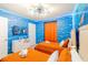 Twin bedroom with Finding Nemo theme and orange bedding at 4154 Lana Ave, Davenport, FL 33897