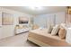 Main bedroom with a king-size bed and stylish decor at 4154 Lana Ave, Davenport, FL 33897