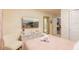 Relaxing bedroom with a comfy bed and en-suite bathroom at 4154 Lana Ave, Davenport, FL 33897