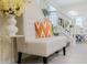 Elegant entryway with bench seating and view of staircase at 4154 Lana Ave, Davenport, FL 33897