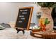 Kitchen counter with welcome sign and vase of flowers at 4154 Lana Ave, Davenport, FL 33897