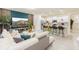 Open concept living and kitchen area with modern decor at 4154 Lana Ave, Davenport, FL 33897