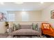 Cozy living area with grey sofa and stylish decor at 4154 Lana Ave, Davenport, FL 33897