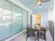 Covered patio with seating area and pool view at 4154 Lana Ave, Davenport, FL 33897