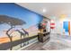 Playroom featuring a large African animal mural and TV at 4154 Lana Ave, Davenport, FL 33897