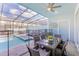 Pool and patio area with seating and dining furniture at 4154 Lana Ave, Davenport, FL 33897
