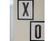 Close-up view of XO wall art in black frames at 4154 Lana Ave, Davenport, FL 33897