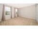 Well-lit bedroom with neutral carpeting and ample closet space at 437 Seattle Slew Dr, Davenport, FL 33837