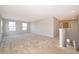 Spacious bonus room with neutral carpeting and ample natural light at 437 Seattle Slew Dr, Davenport, FL 33837