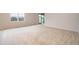 Bright living room with sliding glass doors leading to a backyard at 437 Seattle Slew Dr, Davenport, FL 33837