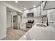 Modern kitchen featuring white shaker cabinets and quartz countertops at 4401 Marshall St, Orlando, FL 32811