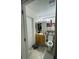 Clean bathroom with wood vanity and toilet at 511 Kilimanjaro Dr, Kissimmee, FL 34758