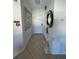 Bright entryway with tiled floors and a modern console table at 511 Kilimanjaro Dr, Kissimmee, FL 34758