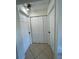 Bright hallway with multiple doors and tile floor at 511 Kilimanjaro Dr, Kissimmee, FL 34758