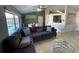 Living room with sectional sofa, dining area, and pool view at 511 Kilimanjaro Dr, Kissimmee, FL 34758