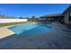 Inviting kidney-shaped pool with surrounding patio at 511 Kilimanjaro Dr, Kissimmee, FL 34758