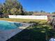 Large backyard with a refreshing pool at 511 Kilimanjaro Dr, Kissimmee, FL 34758