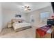 Large bedroom with ceiling fan and neutral decor at 7211 Still Pond Ln, Windermere, FL 34786