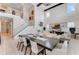 Open dining area with large table and modern chandelier at 7211 Still Pond Ln, Windermere, FL 34786