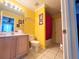 Bright bathroom with a shower/tub combo at 8557 La Isla Dr, Kissimmee, FL 34747