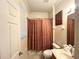 Bathroom includes shower/tub combo and updated vanity at 8557 La Isla Dr, Kissimmee, FL 34747