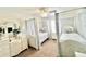 Charming bedroom with twin beds and white furniture at 8557 La Isla Dr, Kissimmee, FL 34747