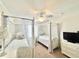 Charming bedroom with twin beds and white furniture at 8557 La Isla Dr, Kissimmee, FL 34747