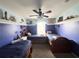 Another charming bedroom with twin beds and a nautical theme at 8557 La Isla Dr, Kissimmee, FL 34747