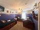 Nautical-themed bedroom featuring three twin beds and charming decor at 8557 La Isla Dr, Kissimmee, FL 34747