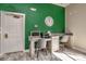 Functional computer room with desks, chairs, a computer, and a printer, great for work at 8557 La Isla Dr, Kissimmee, FL 34747