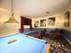 Entertaining game room featuring a pool table and comfortable seating area at 8557 La Isla Dr, Kissimmee, FL 34747