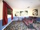 Game room with movie theatre seating, pool table, and film-themed decor at 8557 La Isla Dr, Kissimmee, FL 34747