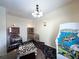 Game room with chessboard, pinball machine, and arcade game at 8557 La Isla Dr, Kissimmee, FL 34747