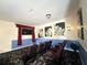 Home theater with seating for multiple viewers and a large screen at 8557 La Isla Dr, Kissimmee, FL 34747
