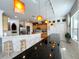 Bright kitchen with wood cabinets and stainless steel appliances at 8557 La Isla Dr, Kissimmee, FL 34747