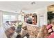 Large living room with leather couches and built-in entertainment center at 8557 La Isla Dr, Kissimmee, FL 34747